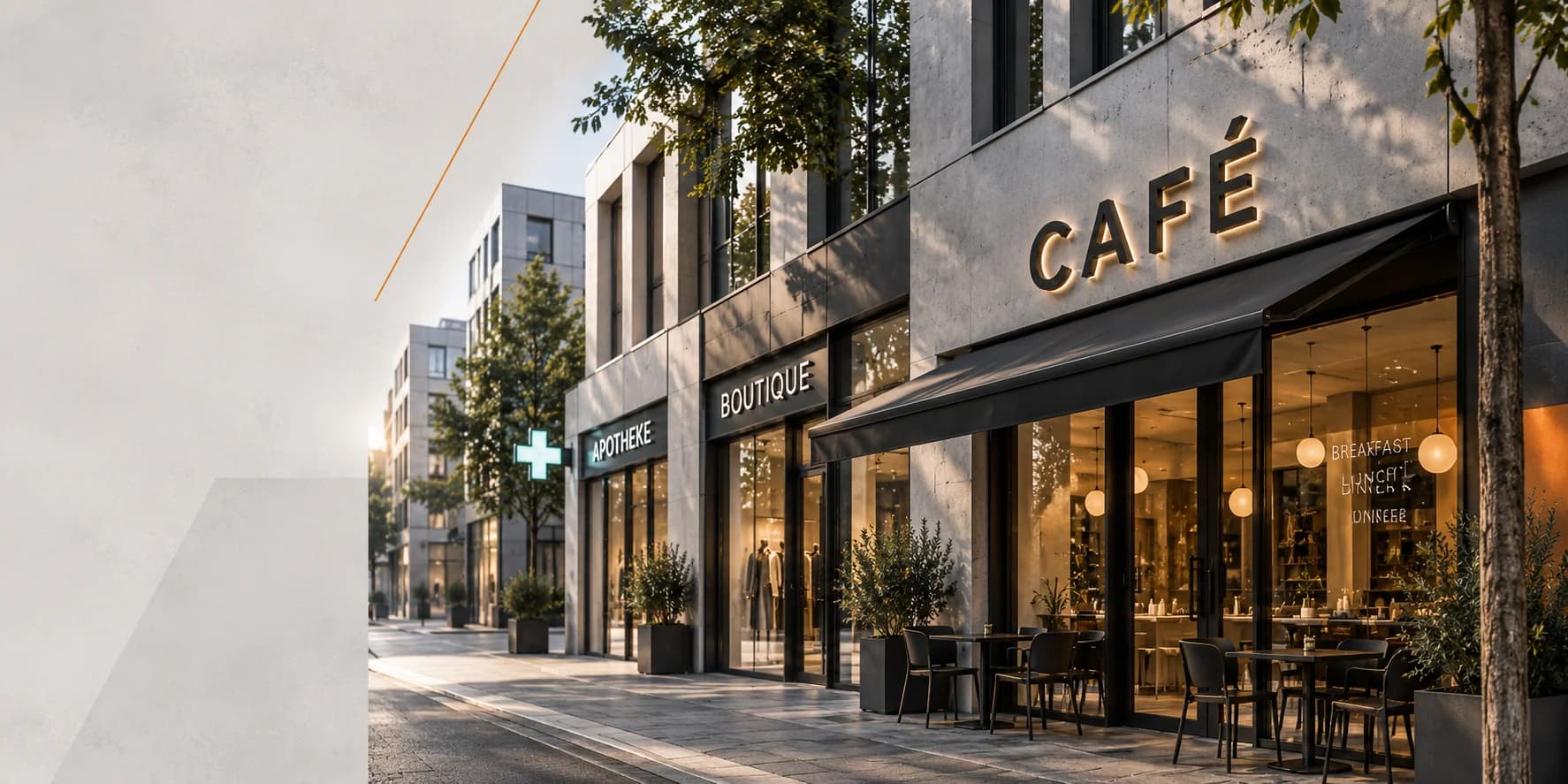 Moderne Geschäftsstraße mit den Fassaden eines Cafés, einer Boutique und einer Apotheke